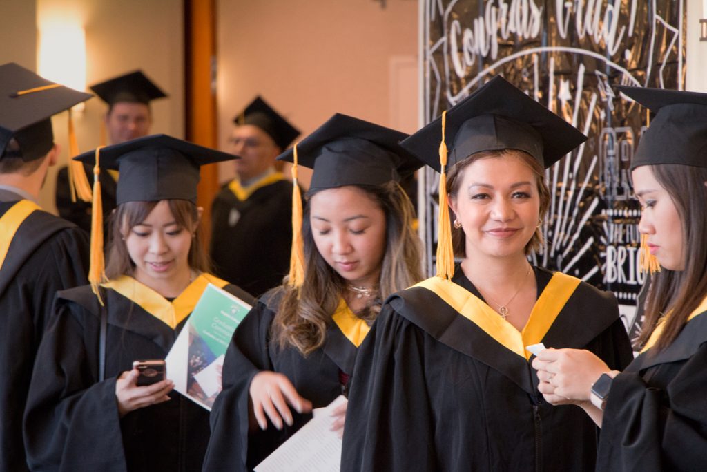 Brighton College graduates of 2018 lining up for their processional entrance.