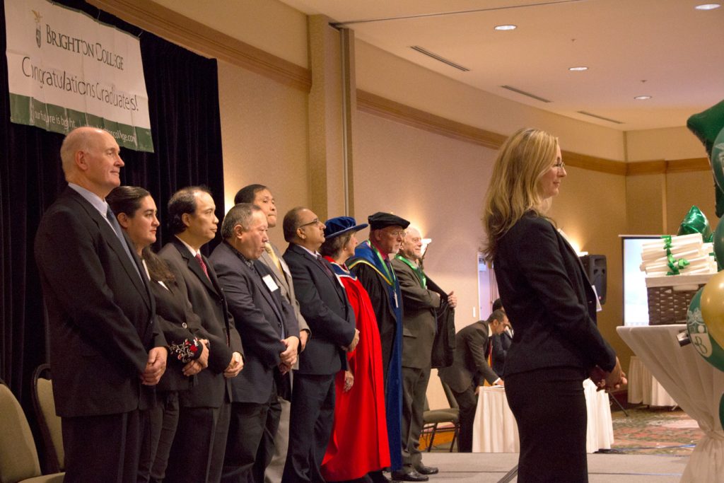 Brighton College's Program Coordinators and Board of Governance Members join our Dean of Academics, Amanda Cabrera, in welcoming the graduates of 2018.