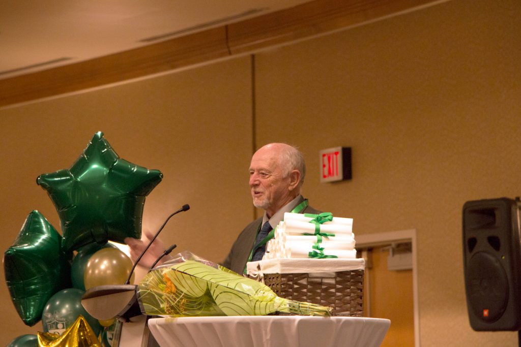 Board of Governance member, Geoff Sale, addressing students during Brighton College's 2018 Graduation Ceremony.